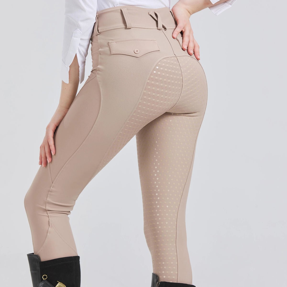 Back view of women's beige equestrian breeches