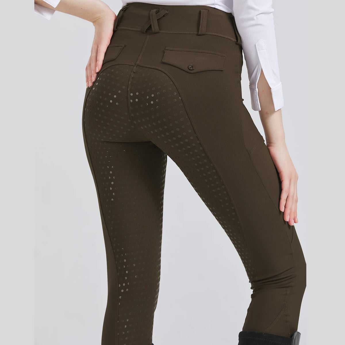 Back view of women's brown horse riding breeches
