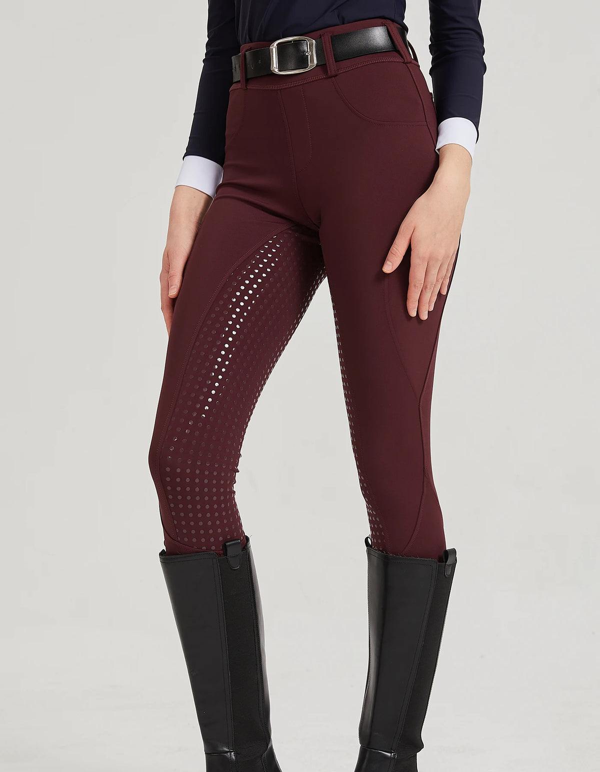 Front view of women's burgundy horse riding breeches