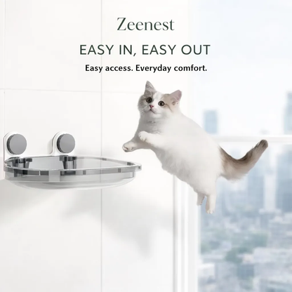 Cat climbing onto Zeenest™ CloudView Window Hammock attached to a window